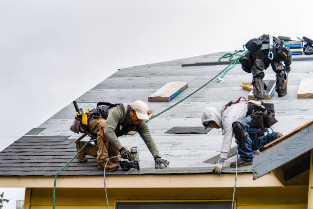 Professional Roofing technician working in Long Pond, PA